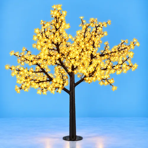 Árbol de flores luminosas sobre fondo azul